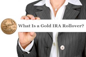 Woman holding a sign with a gold coin and the word what is a gold ira rollover